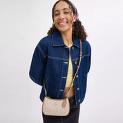 Coach Outlet Teri Mini Crossbody Bag In Signature Canvas