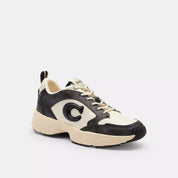 Coach Outlet Strider Sneaker In Signature Canvas