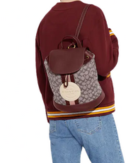 Coach Dempsey Drawstring Backpack In Signature Jacquard With Coach Patch And Stripe