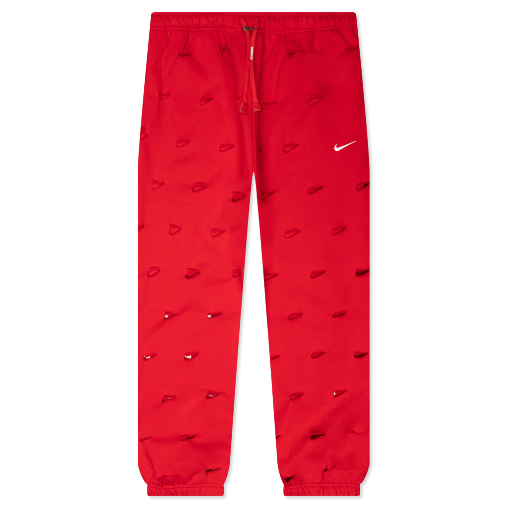 Nike-x-Jacquemus-NRG-HE-Swoosh-Pant---University-Red-FJ3268-657-02-26-24-Feature-JP.jpg