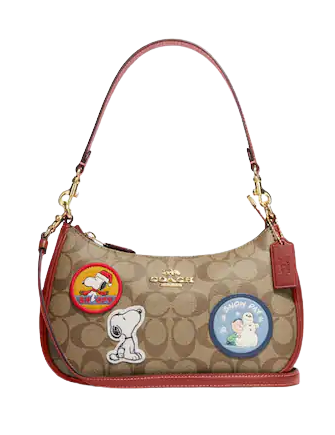 coach-coach-x-peanuts-teri-shoulder-bag-in-signature-canvas-with-patches.png