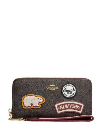 coach-long-zip-around-wallet-in-signature-canvas-with-ski-patches.png